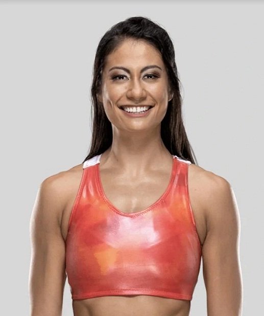 The woman with the red hair appears to be Santana Garrett - Wrestling